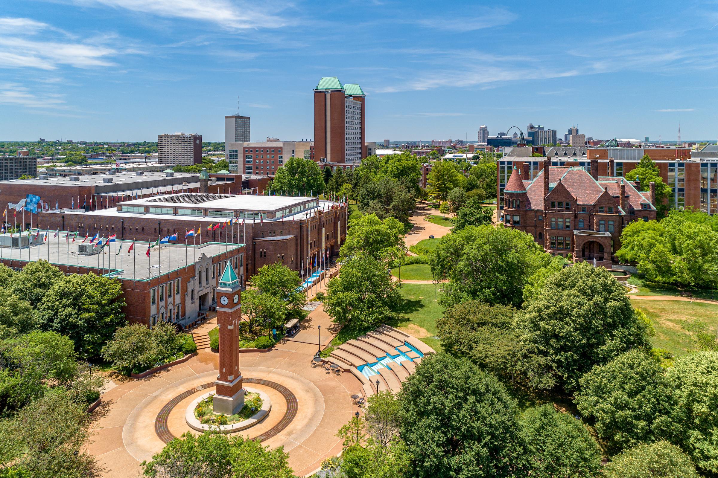 A view of 博彩网址大全's clock tower and fountain, one of the most popular gathering places on campus on warm days. 